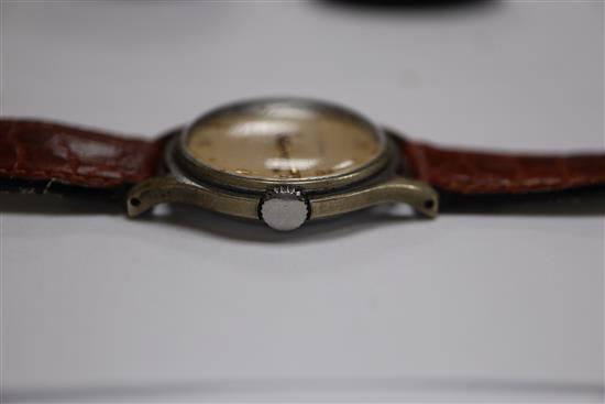 A gentlemans Jaeger Le Coultre wristwatch with red seconds hand, dated 1950 and a Bucherer gold plated